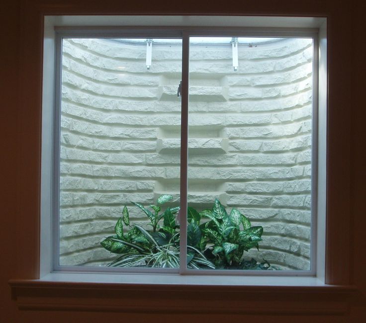 how to make basement window wells more attractive