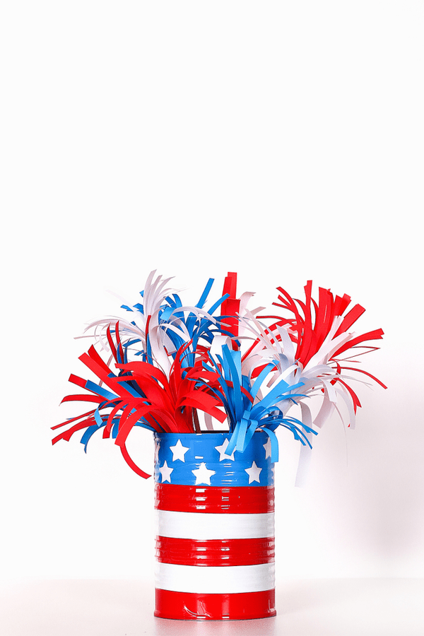 Here are some DIY recycled 4th of July crafts for you to make and enjoy. These crafts feature things you can recycle, which saves you money. It also makes them more unique and fun! This tin can craft can be used for so many different things! 