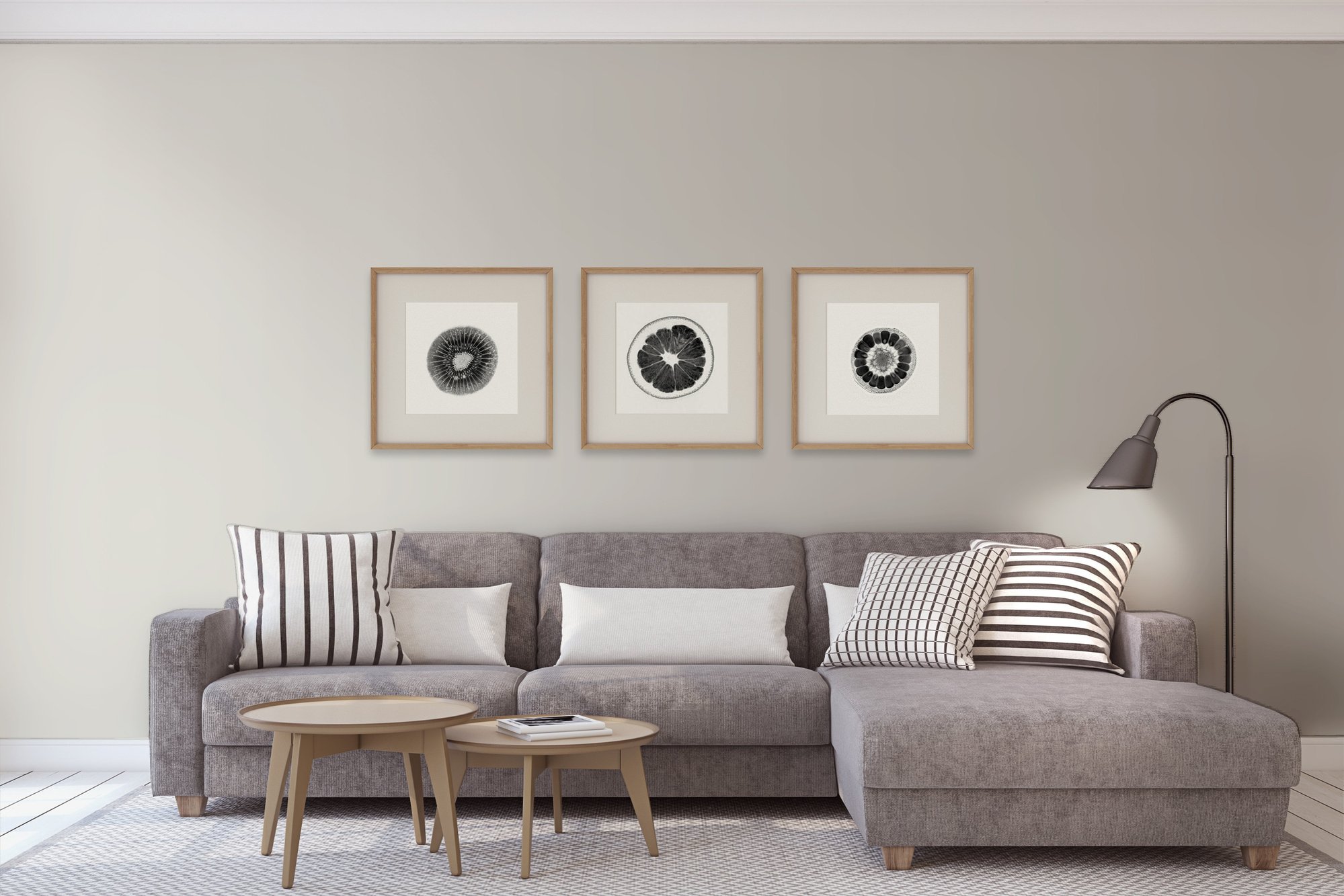 Pewter colored wall with gray couch, wood tables, and art on the wall - what color is pewter
